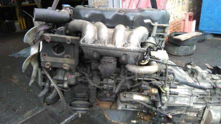 двигатель 4D33 на MITSUBISHI CANTER FE51C  (Мицубиси Кантер)